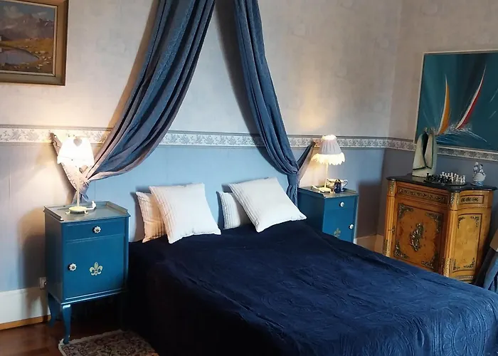 Le Coq En Pate 住宿加早餐酒店 比桑